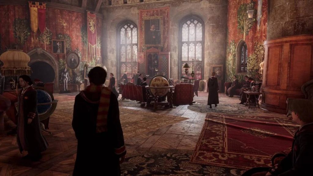 the player character from Hogwarts Legacy walking through the Gryffindor common room with two large windows in front of them and many students sat in front talking