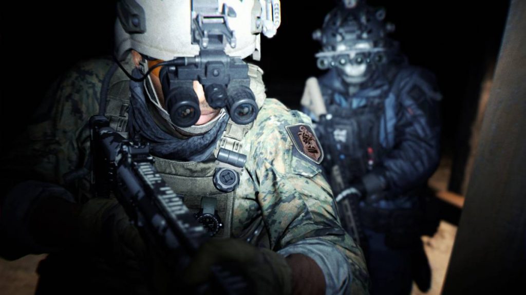 two soldiers in full military gear wearing night vision goggles walking down a corridor with a bright light shining on them