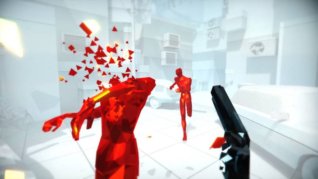 a pistol shooting red guys in a white environment in Superhot