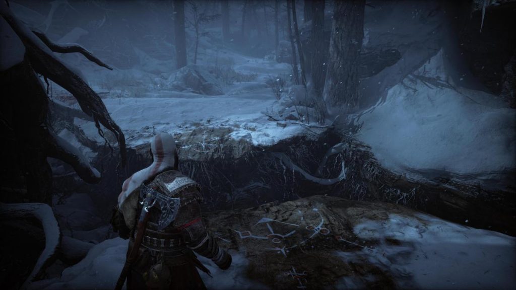 Kratos stood next to a gap with a platform on the other side in God of War Ragnarok