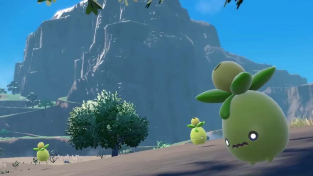 a group of Smolivs near trees in Pokemon Scarlet and Violet