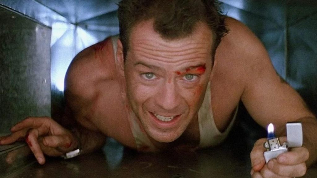 John McClane crawling through an air duct in Die Hard