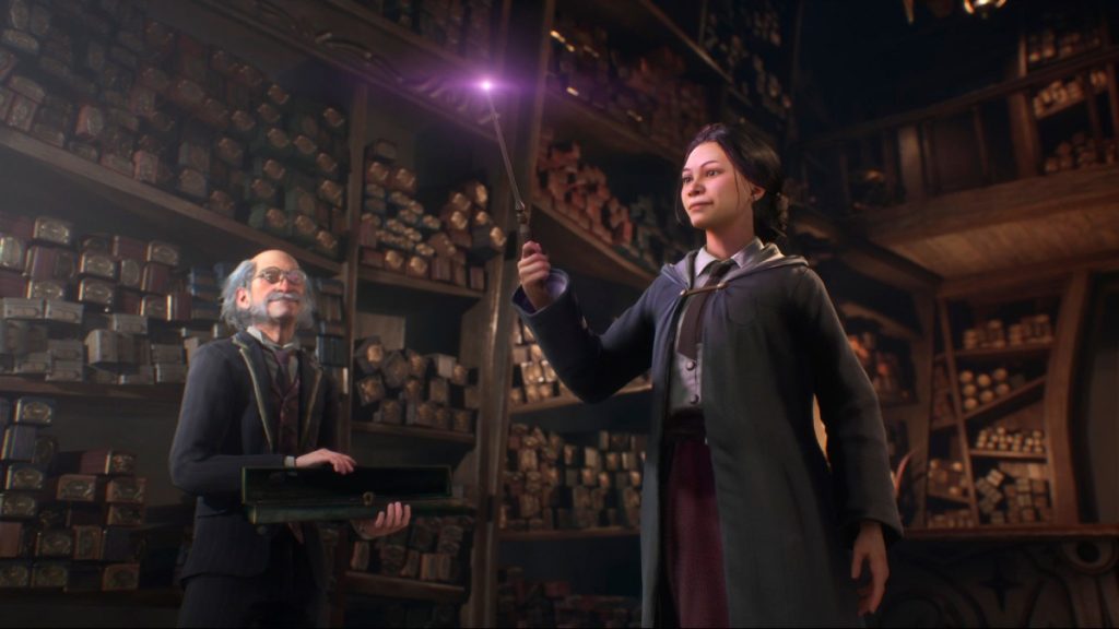 student in Hogwarts Legacy holding a wand