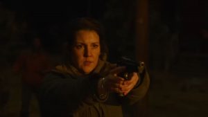 Kathleen holding a gun in The Last of Us