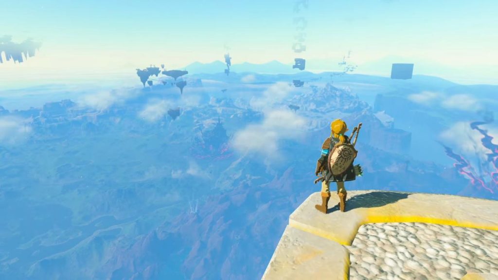 Link stood on the edge of a platform looking out at the floating platforms above Hyrule in Tears of the Kingdom