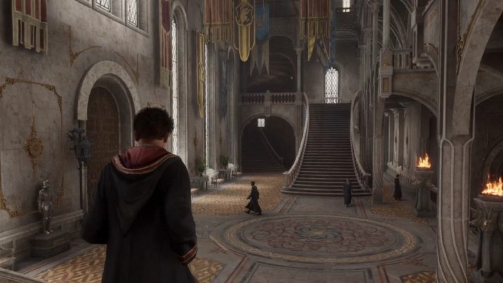 player walking through Hogwarts in Hogwarts Legacy