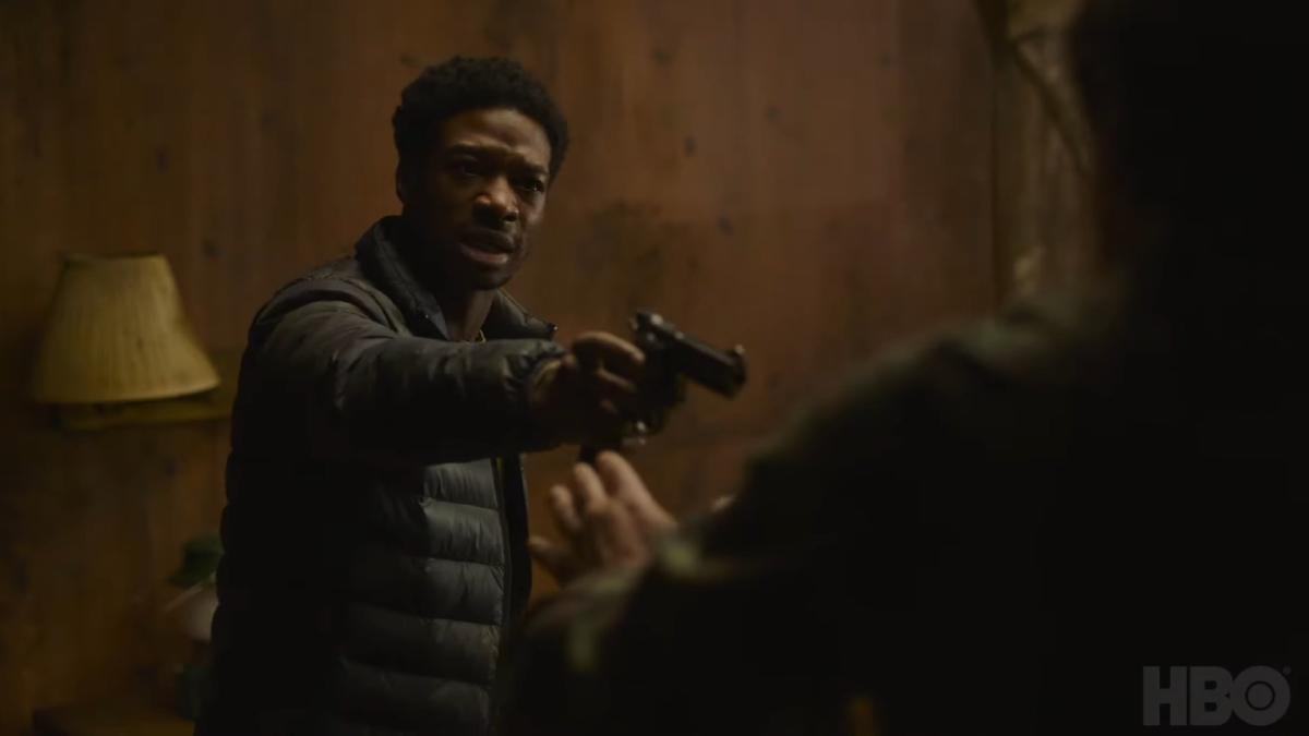 Henry pointing a gun at Joel at the end of episode 5 of The Last of Us