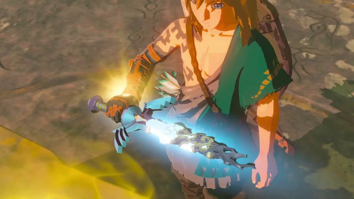 Link holding a broken Master Sword in Tears of the Kingdom