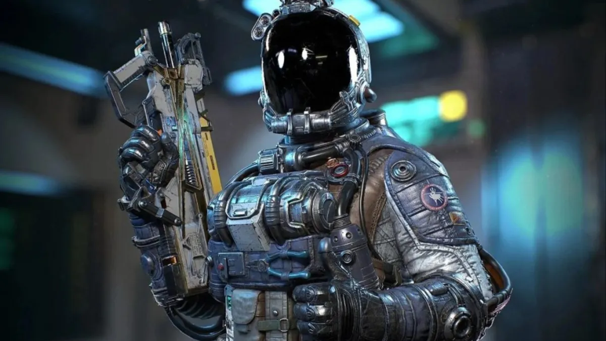Player in space suit holding SMG with thumbs up in Starfield
