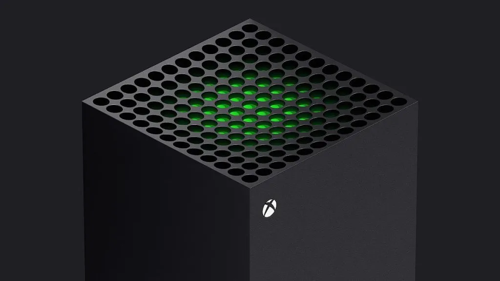 Image of the top of the Xbox Series X glowing green