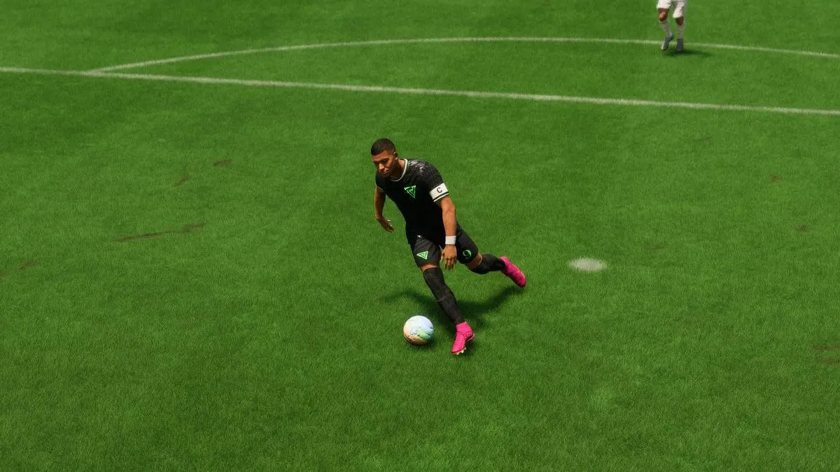 Kylian Mbappe keeping close control of the ball while dribbling in EA FC 24