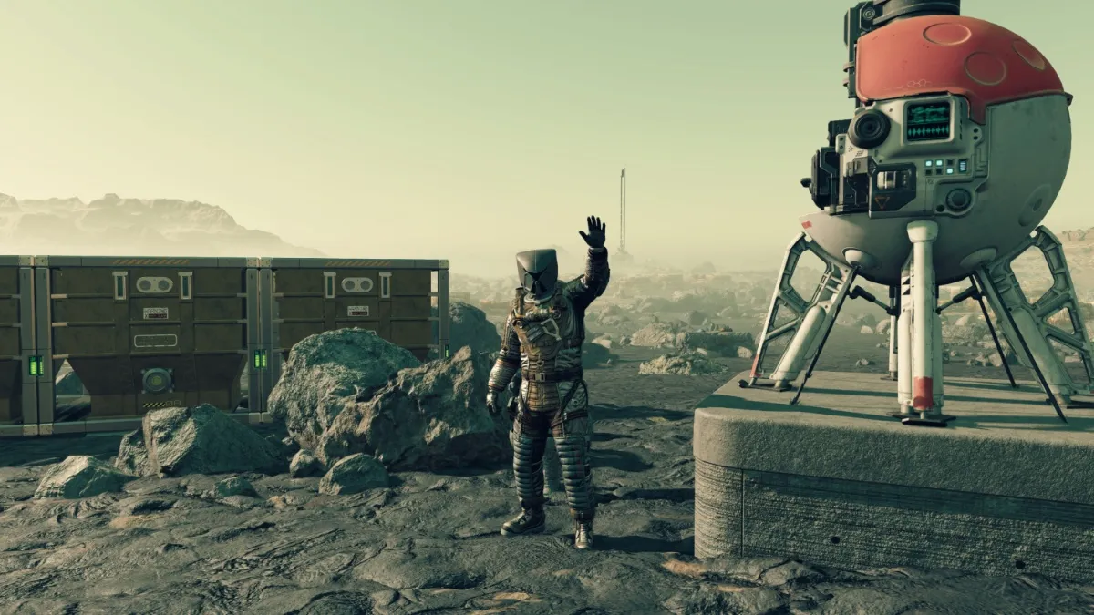Player waving at camera standing next to Outpost Beacon and storage containers at Outpost on Bessel III-b in Starfield